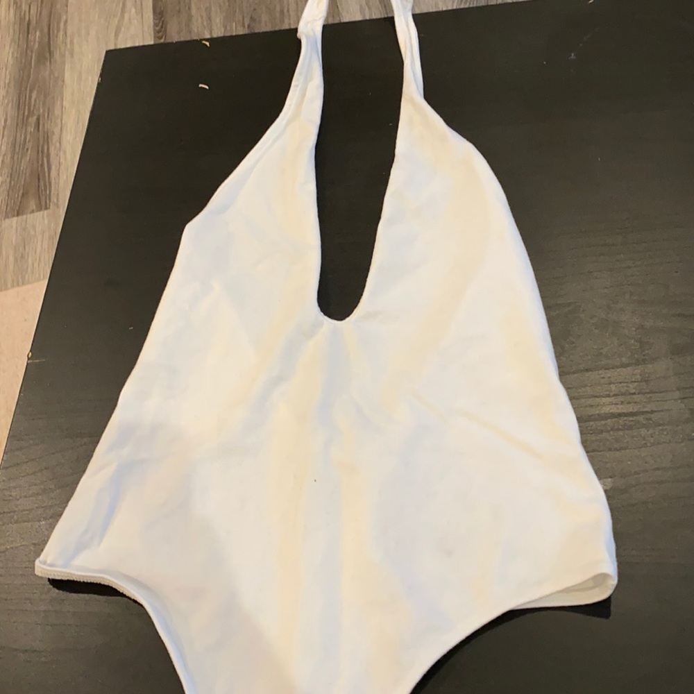 White halter deep cut body suit